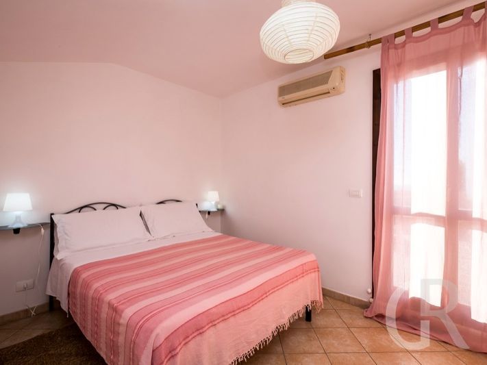 casa-scirocco-schlafbereich-mit-grossem-bett.jpg