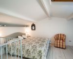 casetta-doppelbett-in-der-dachschraege.jpg