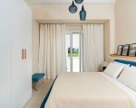 ferienhaus-villa-mora-grosses-bett-schlafbereich.jpg