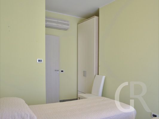 ferienwohnung-pistacchio-schlafzimmer-mit-zwei-einzelbetten.jpg