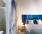 villa-corte-moscata-blaues-doppelbett.jpg