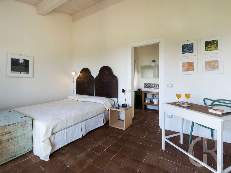 villa-cuore-verde-schlafzimmer-mit-grossem-bett.jpg