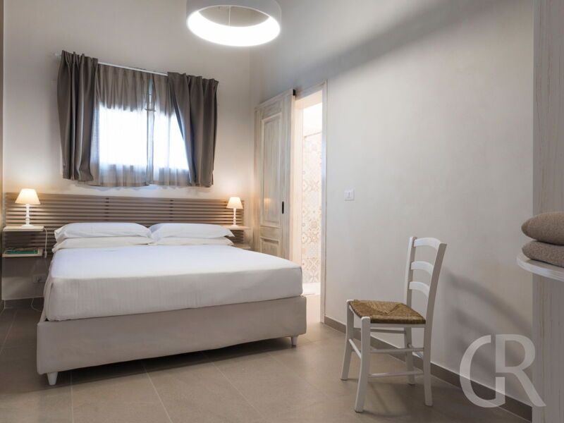 villa-del-mito-kleineres-schlafzimmer-mit-doppelbett.jpg
