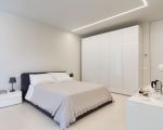 villa-greta-grosses-doppelbett-im-schlafzimmer.jpg
