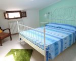 ferienwohnung-antonio-schlafzimmer-mit-doppelbett.JPG