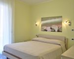 ferienwohnung-pistacchio-schlafzimmer-mit-doppelbett.jpg