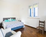 villa-ala-doppelbett-im-schlafraum.jpg