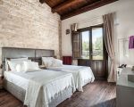 villa-corte-moscata-schlafbereich-mit-grossem-bett.jpg