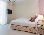 villa-giutitta-rosa-schlafzimmer.jpg