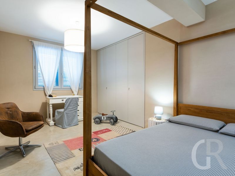 casa-degli-aranci-sessel-im-schlafzimmer.jpg