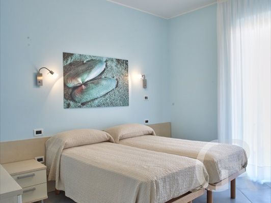 ferienwohnung-cobalto-schlafzimmer-mit-ausgang-auf-den-balkon.jpg