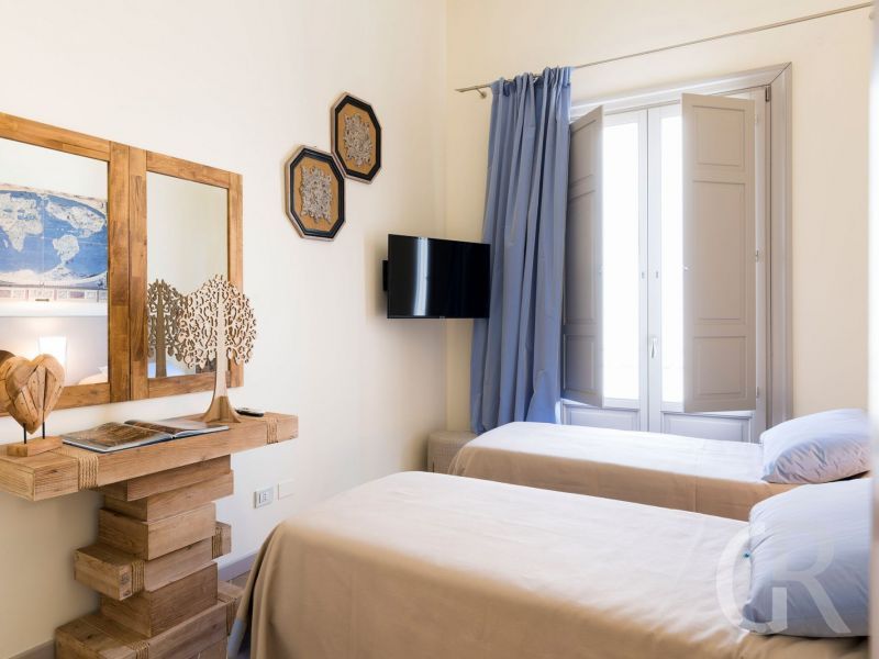 ferienwohnung-dimora-gemuetliches-schlafzimmer.jpg