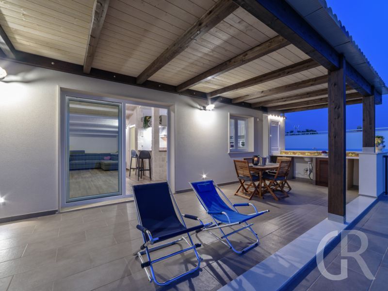 ferienwohnung-ducezio-dachterrasse-am-abend-mit-mmerblick.jpg