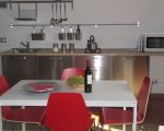 ferienwohnung-tarocco-kueche-essplatz.JPG