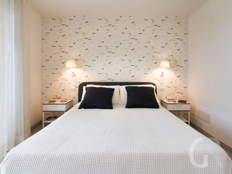 villa-blumarine-schlafberfeich-mkit-bett.jpg