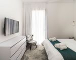 villa-bonita-schlafzimmer-mit-kommode-und-tv.jpg