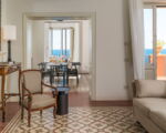 villa-continella-wohnbereich-2-mit-esszimmer-und-blick-zum-meer.jpg