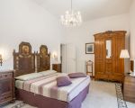 villa-la-forma-sizilianisches-bett.jpg