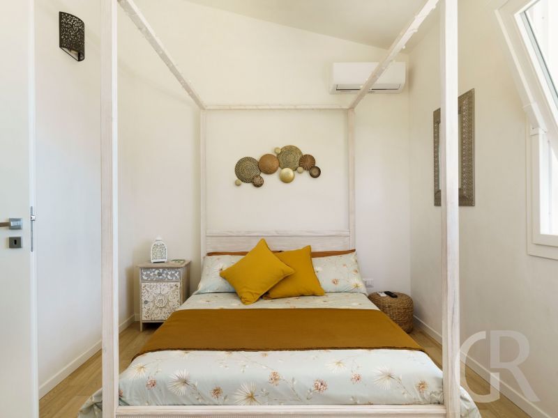 ferienhaus-marinella-doppelbett.jpg