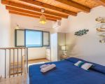 ferienwohnung-amarillis-schlafzimmer-im-obergeschoss.jpg