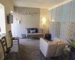 ferienwohnung-platone-wohnraum-mit-sofa.jpg