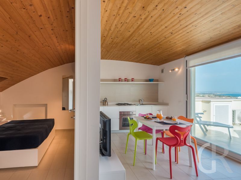ferienwohnung-rosmarino-kueche-und-schlafraum.jpg