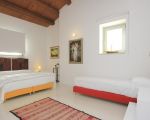 schlafzimmer-mit-doppel-und-einzelbett.jpg