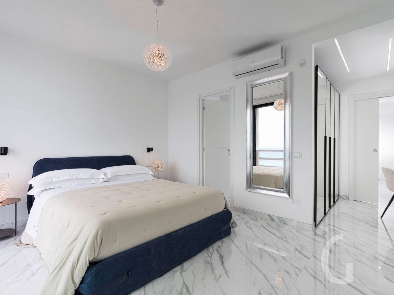 villa-hermes-schlafraum-mit-bett.jpg