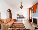 villa-profumo-offener-kamin-im-wohnzimmer.jpg