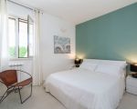 villa-stella-maris-weisses-doppelbett.jpg