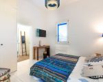caponegro-schlafzimmer-mit-doppelbett.jpg