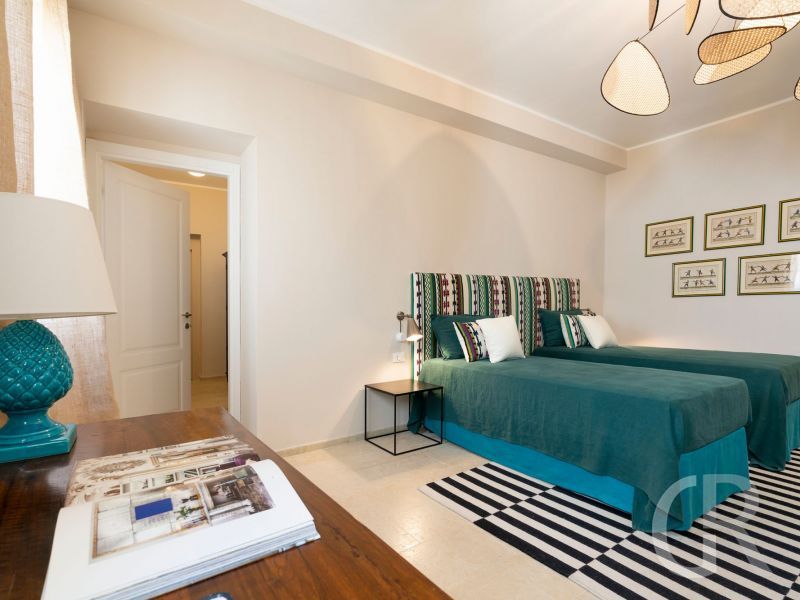 ferienwohnung-aurispa-gruenes-schlafzimmer.jpg