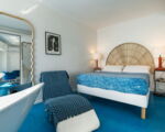 montalbano-suite-schlafzimmer-mit-doppelbett.jpg