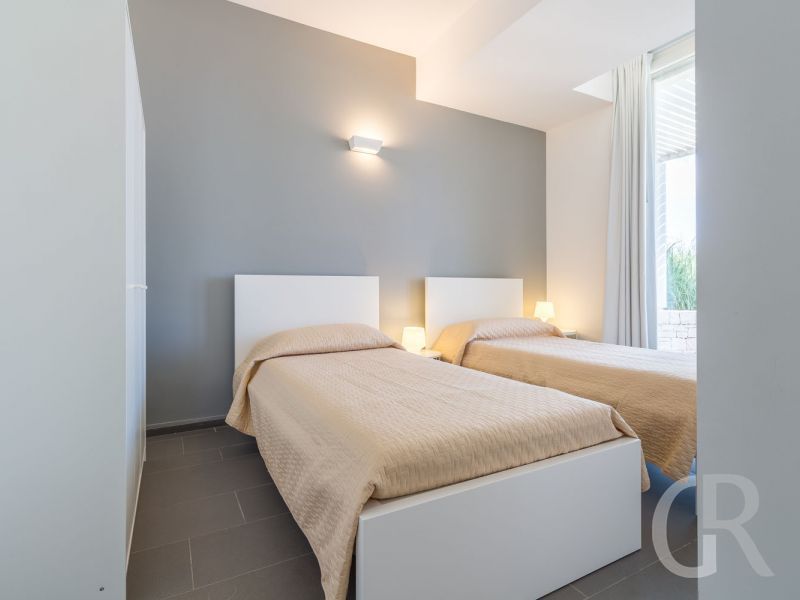 villa-anthea-schlafzimmer-mit-gemuetlichen-betten.jpg