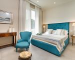 villa-isabella-blaues-bett.jpg
