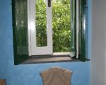 zimmer-im-pippinitto-fenster-zum-garten.jpg