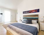 ferienhaus-marinella-grosses-schlafzimmer.jpg