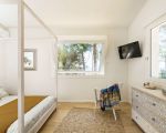 ferienhaus-marinella-helles-schlafzimmer.jpg