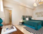 ferienwohnung-aurispa-gruenes-schlafzimmer.jpg