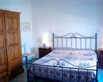 ferienwohnung-la-scuderia-bett.jpg