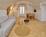 ferienwohnung-raffo-wohnruam-mit-sofa.jpg