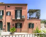 ferienwohnung-sette-capelli-blick-auf-das-rote-haus.jpg