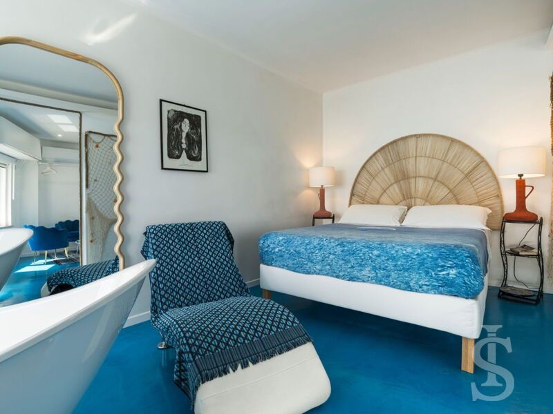 montalbano-suite-schlafzimmer-mit-doppelbett.jpg