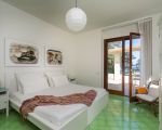 villa-coralia-schlafbereich-mit-bett.jpg