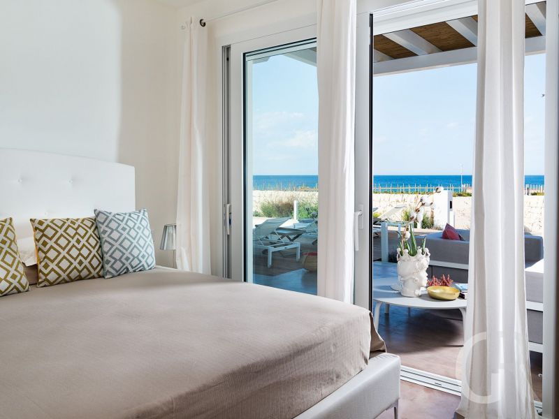 villa-fico-bett-mit-blick-ins-freie.jpg