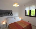 villa-flora-schlafraum-mit-doppelbett.jpg