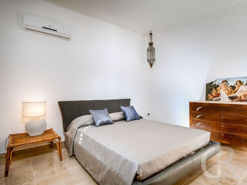 villa-profumo-schlafzimmer-mit-doppelbett.jpg