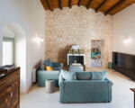 casa-ninetta-gruenes-sofa.jpg