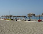 ferienwohnung-san-giorgio-strand-mit-sonnenschirmen.jpg