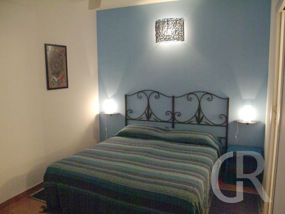 villa-al-mare-schlafzimmer-mit-gemuetlichem-doppelbett.jpg